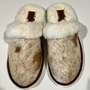 Plush cowhide slides/slippers. Size 9. Worn once.